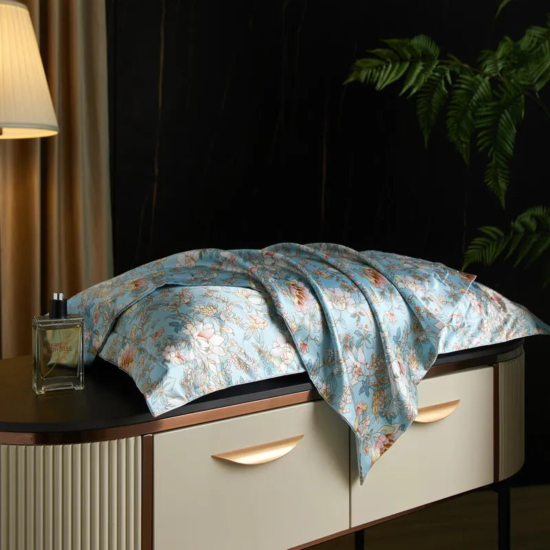 Aqua Garden print on the Daylilt Meadow Drift silk-blend pillowcase pair