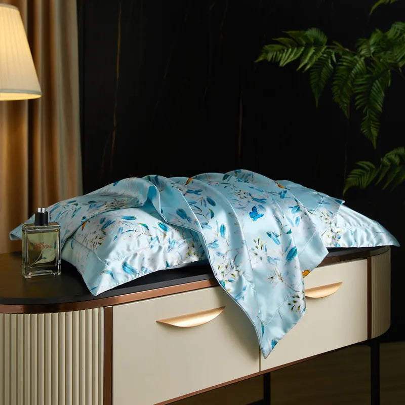 Sky Bouquet print on the Daylilt Meadow Drift silk-blend pillowcase pair