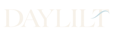 Daylilt wordmark in warm pearl with a mist blue silk fold